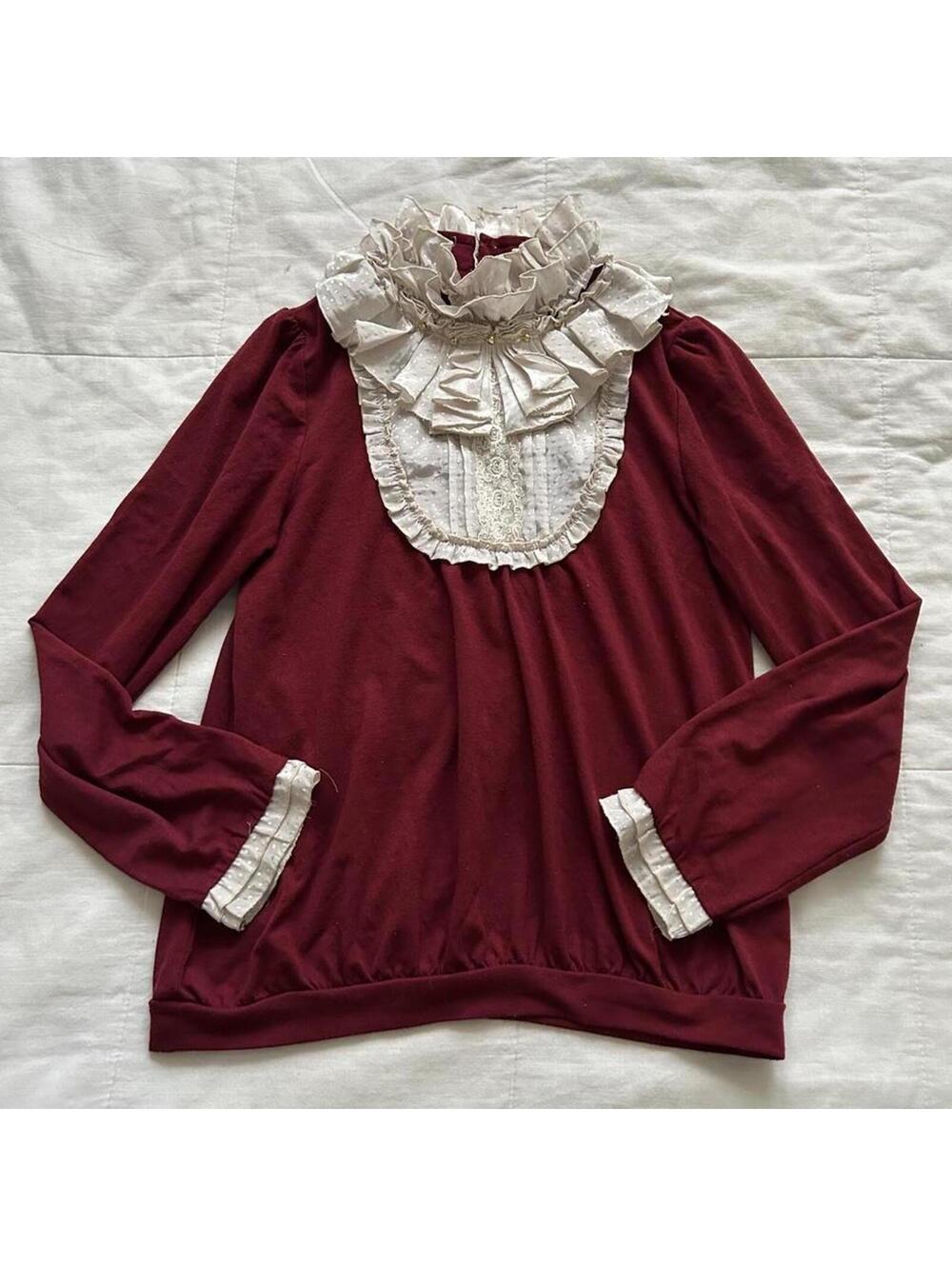 Axes Femme burgundy red long sleeve blouse with white ruffles and lace details
